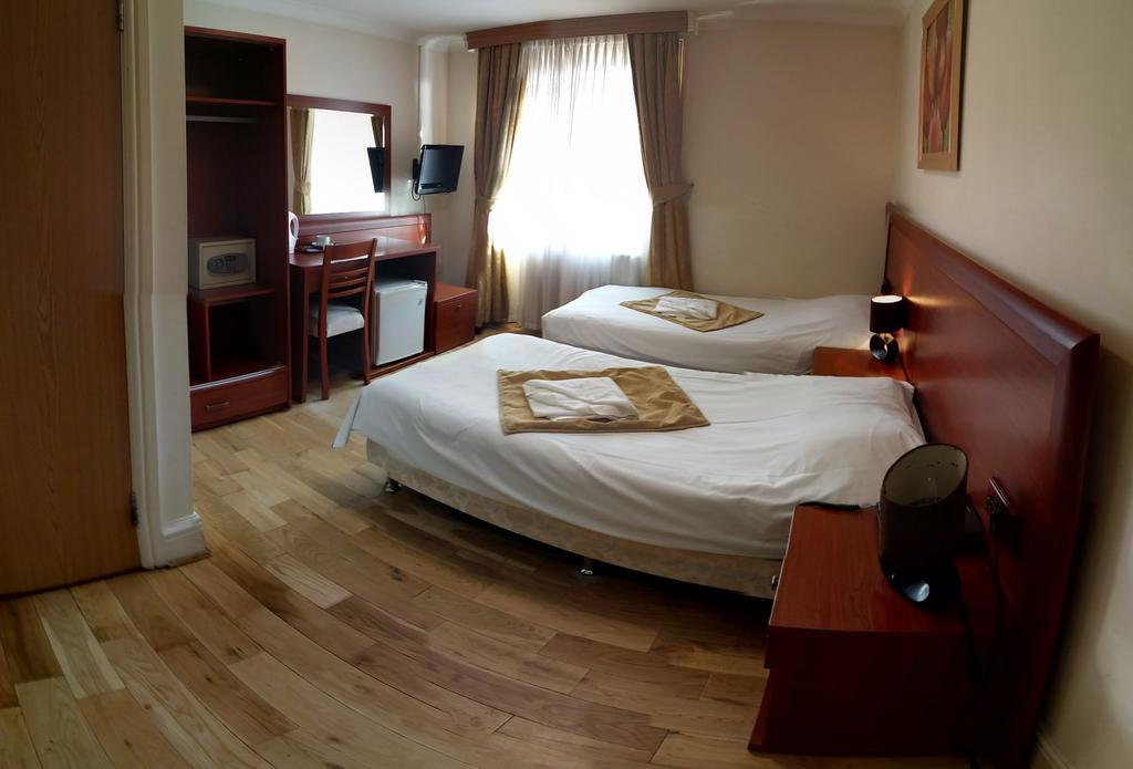 Corner House Hotel London Rum bild